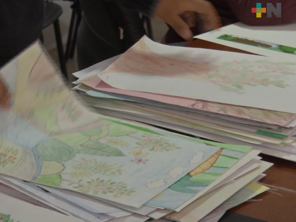 Evalúan trabajos estatales del concurso “Vamos a pintar un árbol”