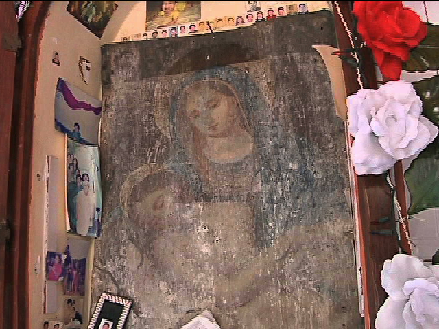 Coatepecanos le rezan a “la virgen de la lámina”