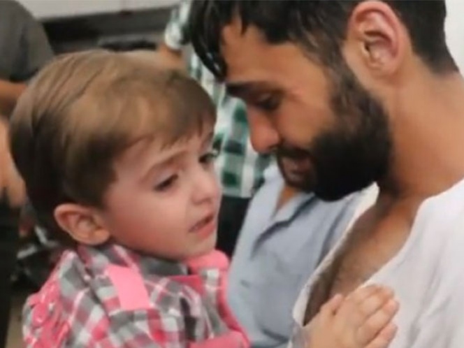 Conmovedor reencuentro entre padre e hijo tras ataque químico en Siria