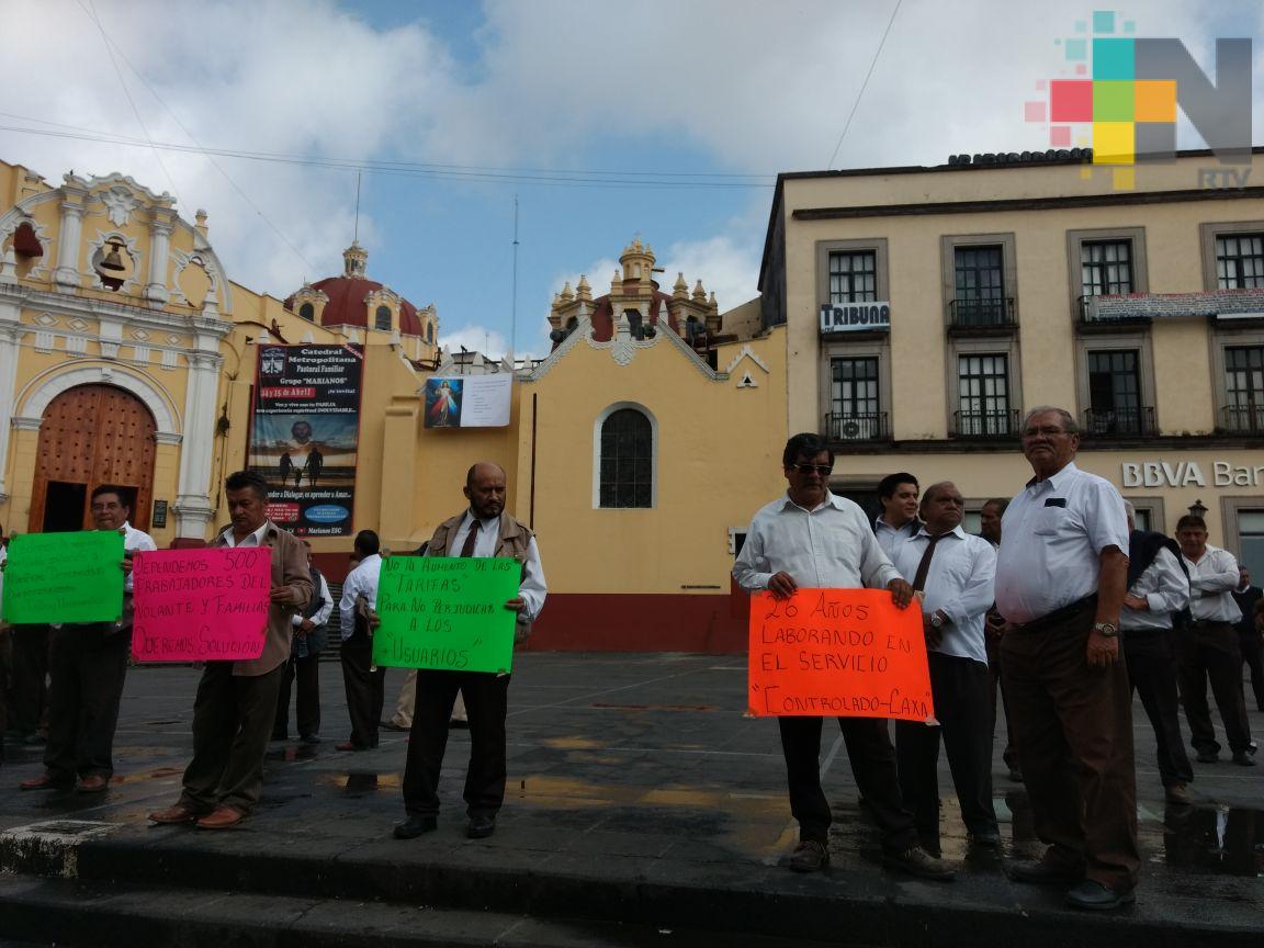 Taxistas de CAXA protestan por imposición de otro grupo de taxis