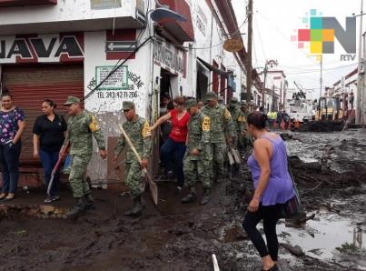 Suman dos muertos y cinco desaparecidos tras desborde de río en Jalisco