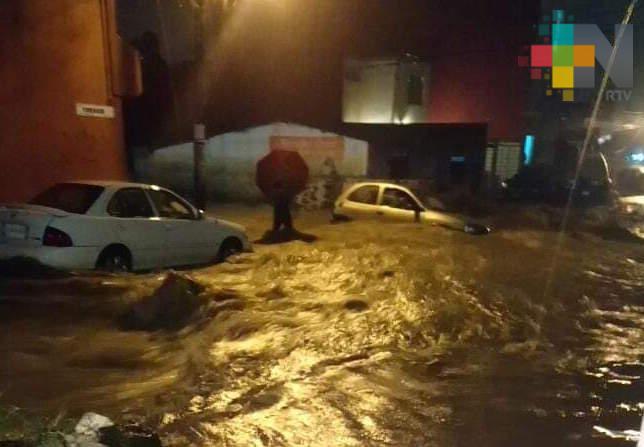 Afectadas 17 colonias por lluvias en Xalapa; calles inundadas por alcantarillas tapadas