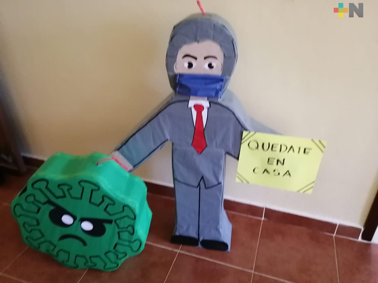 En Xalapa, elaboran piñatas de Coronavirus y López-Gatell