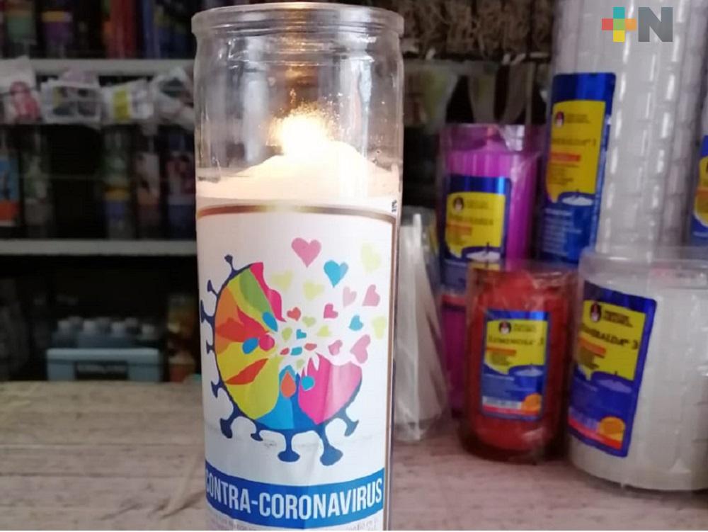 En mercados de Xalapa, ponen en venta veladoras para protegerse contra COVID-19