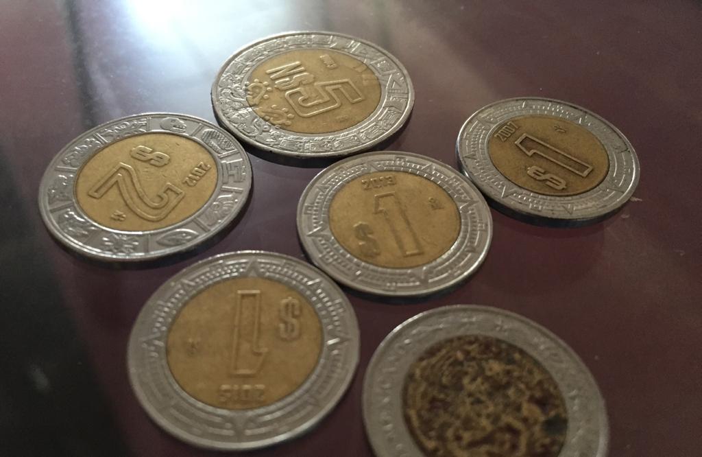 Peso pierde 19 centavos en arranque de fase 3 de contingencia