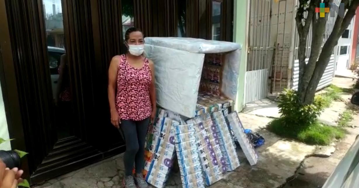 Asociación recoleta envases de Tetra Pak para convertirlos en casas para mascotas