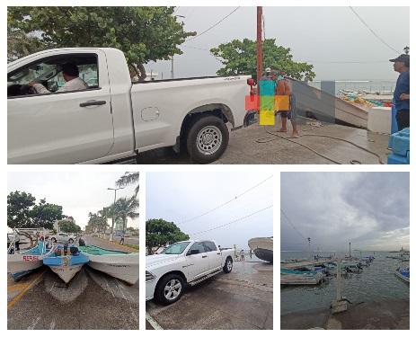 A marchas forzadas, pescadores del puerto de Veracruz sacan sus embarcaciones del mar