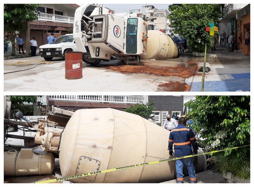 Chofer lesionado al caer camión en hundimiento de calle del puerto de Veracruz