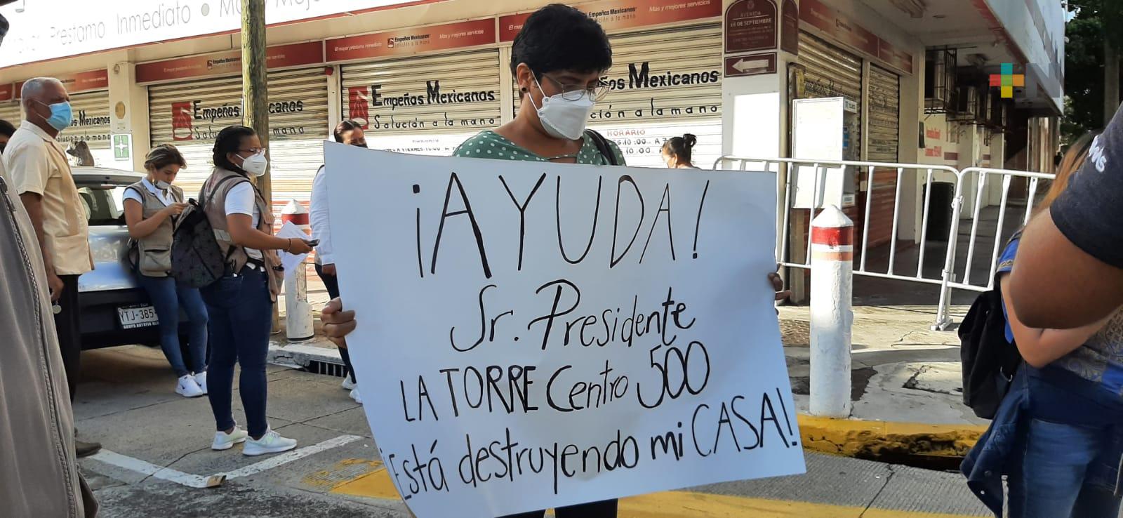 Afectada por construcción de Torre Centro pide apoyo por daños en su vivienda