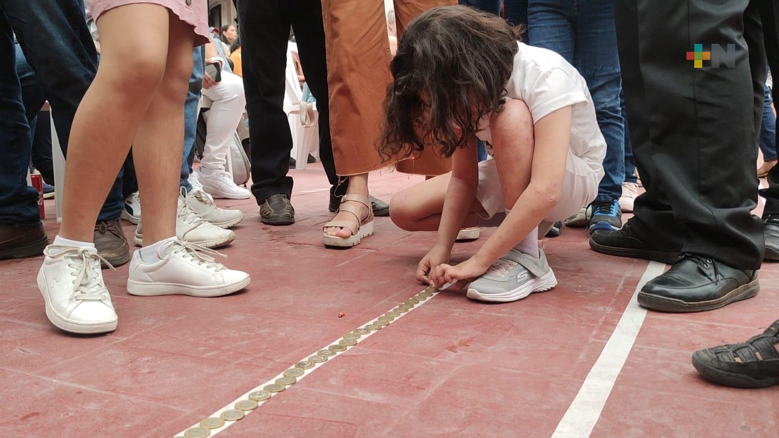 Realizan kilómetro de la moneda para apoyar a orquesta sinfónica de secundarias técnicas de Coatza