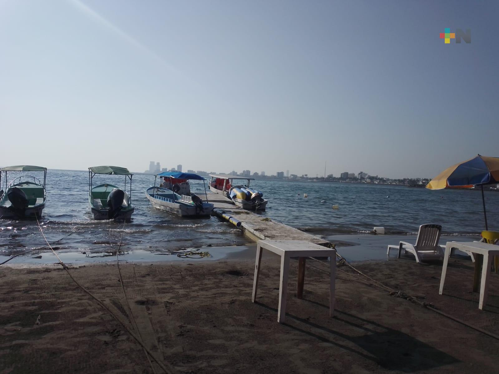 Ligero repunte de turistas los fines de semana en playa Villa del Mar de Veracruz