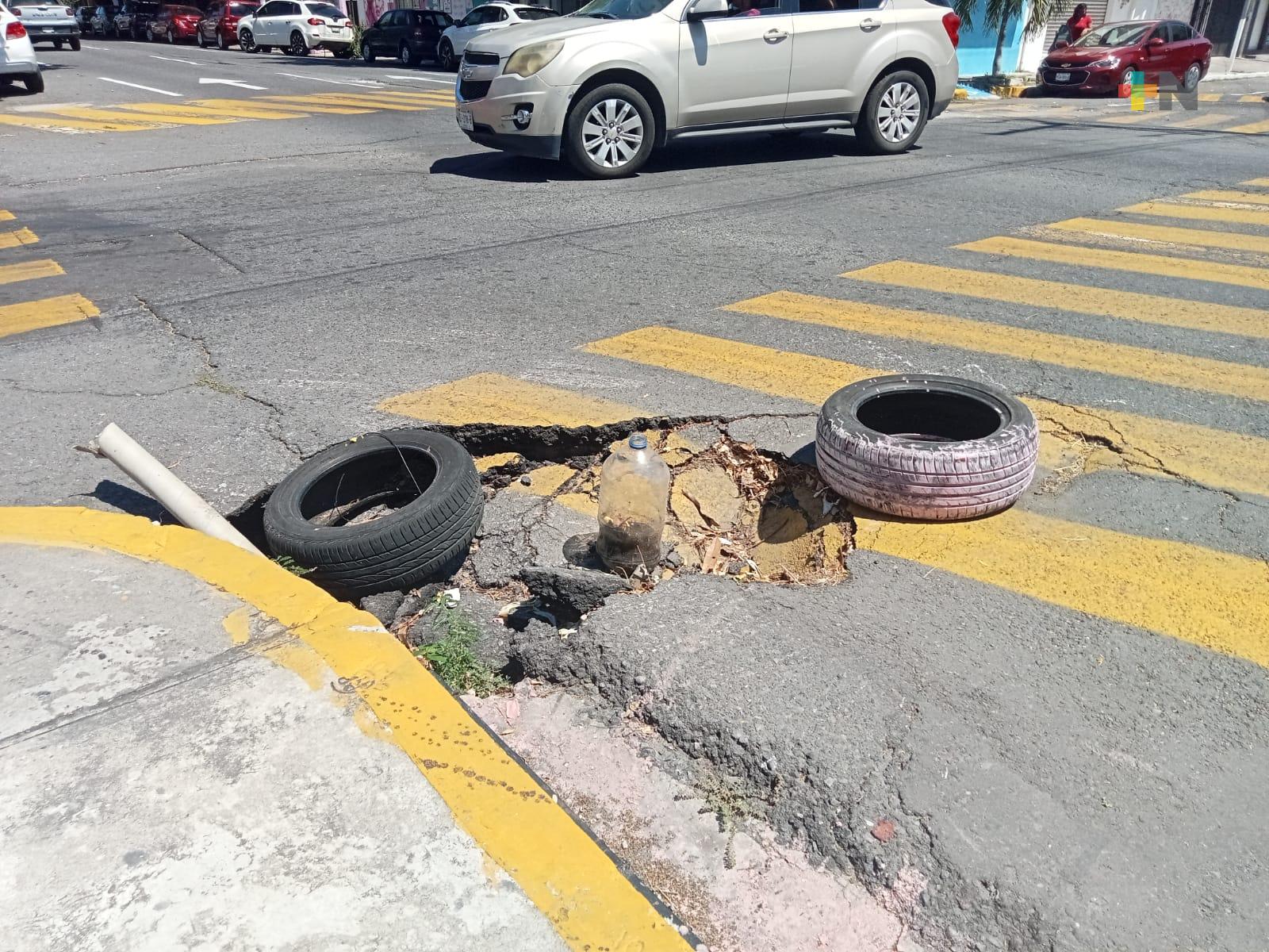 Reportan hundimiento en calles Héroes de Puebla y Orizaba de Veracruz puerto