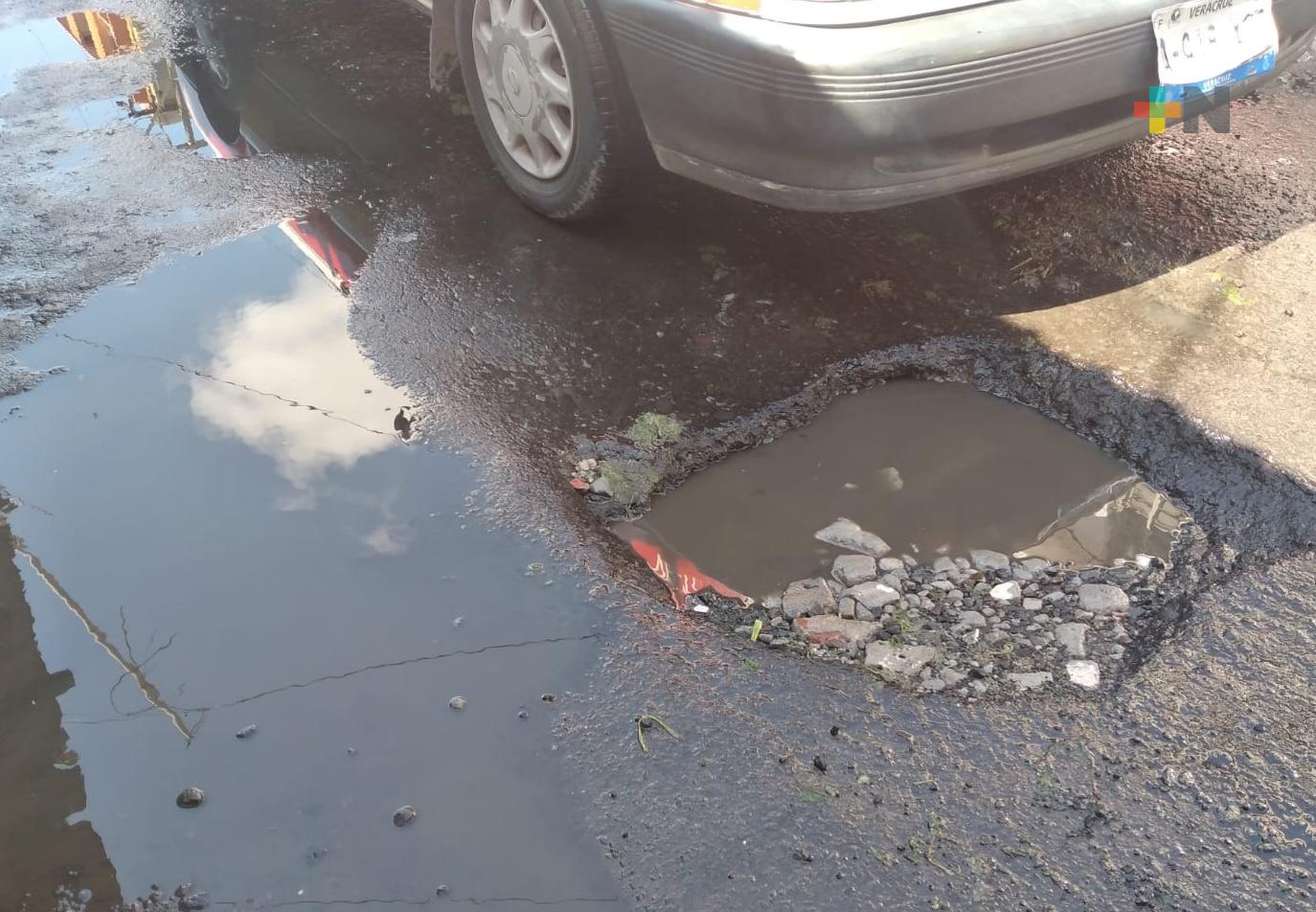 Mal estado de calles afectan comercio en mercado Unidad Veracruzana