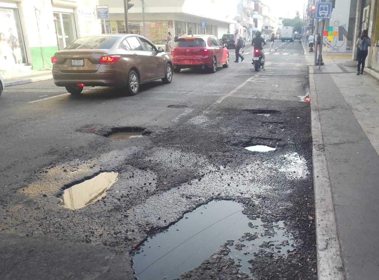 En el puerto de Bache-cruz, conductores se quejan por mal estado de calles y avenidas