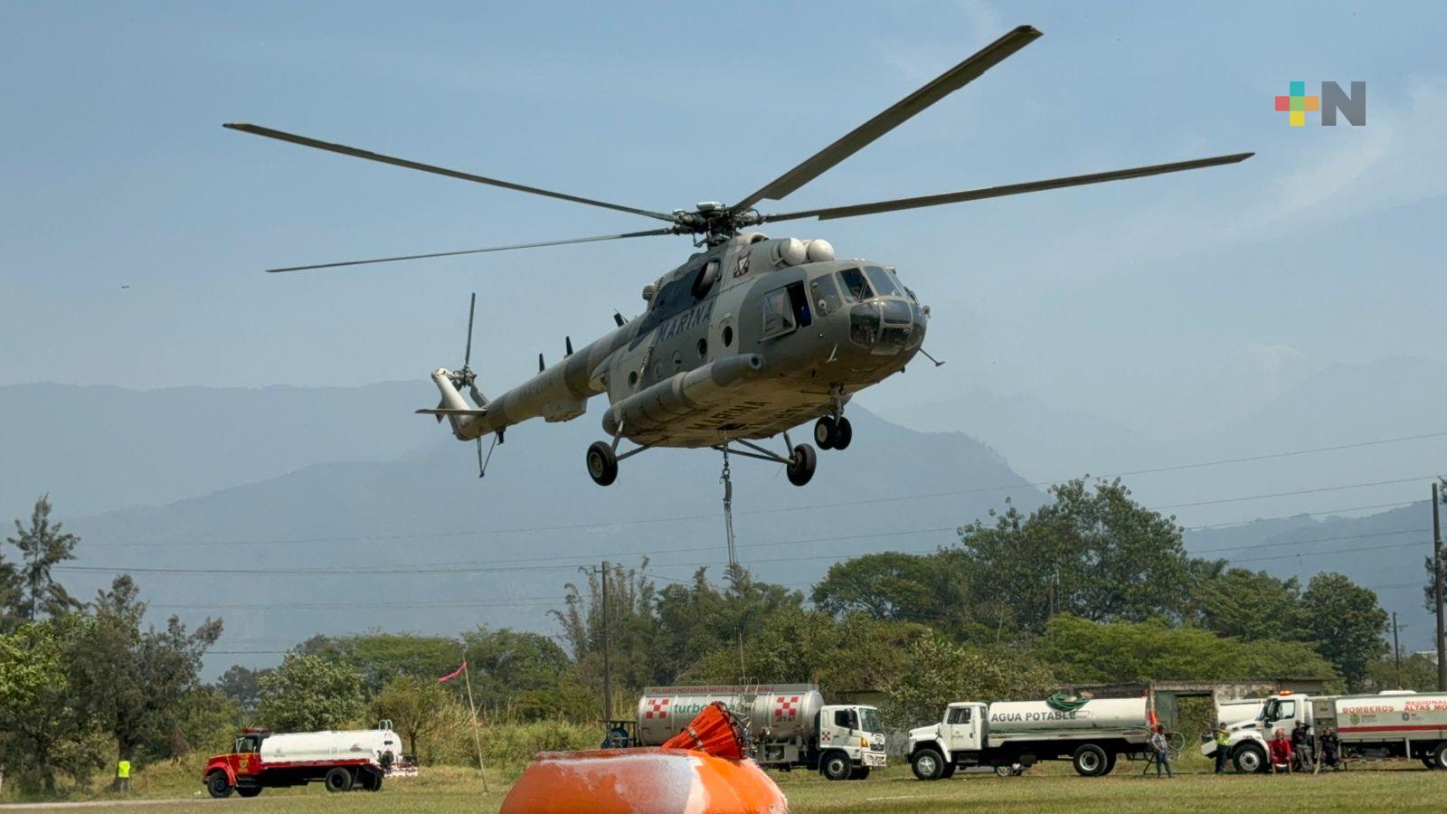 Dos aeronaves realizan ataques aéreos en incendio de Tlilapan