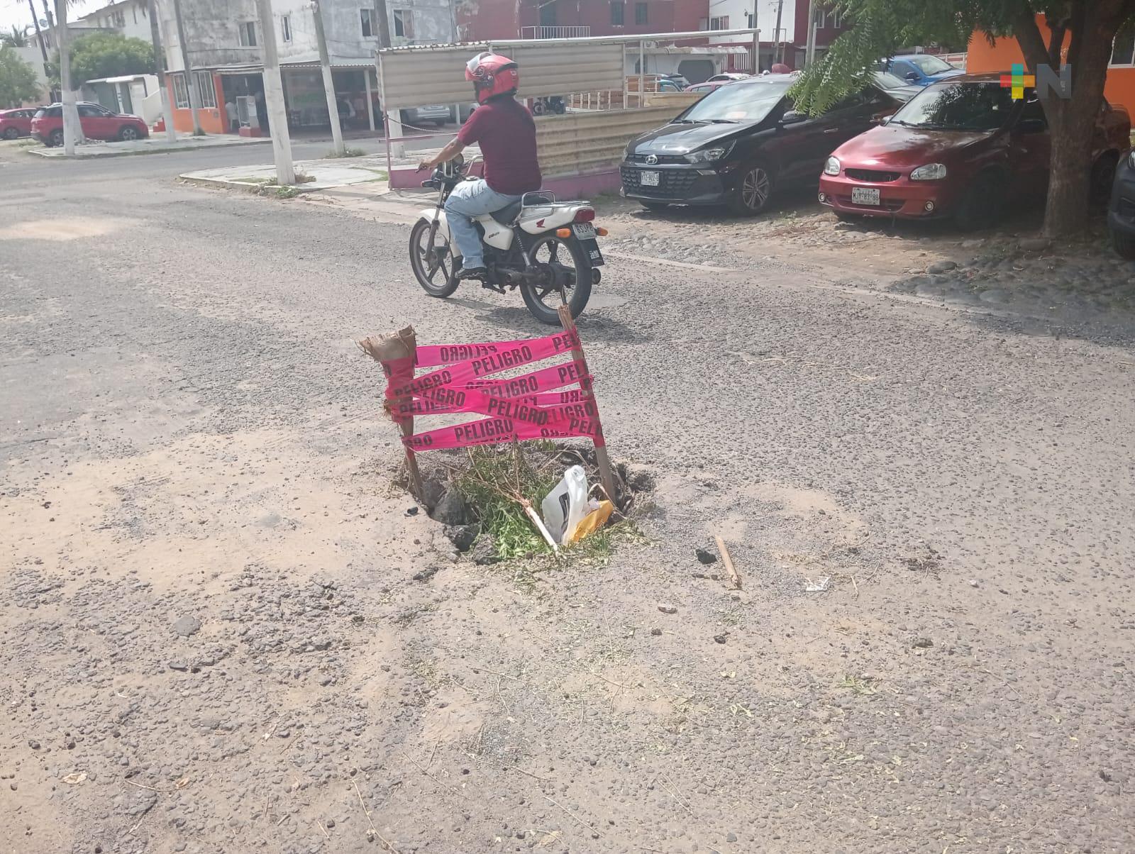 En unidad habitacional de Veracruz puerto se quejan de hundimiento causado por Grupo MAS