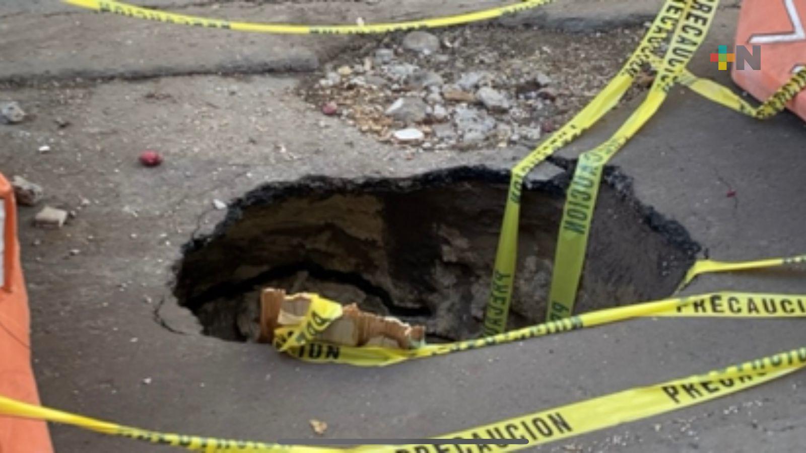 Baches siguen causando daños a vehículos en Veracruz puerto