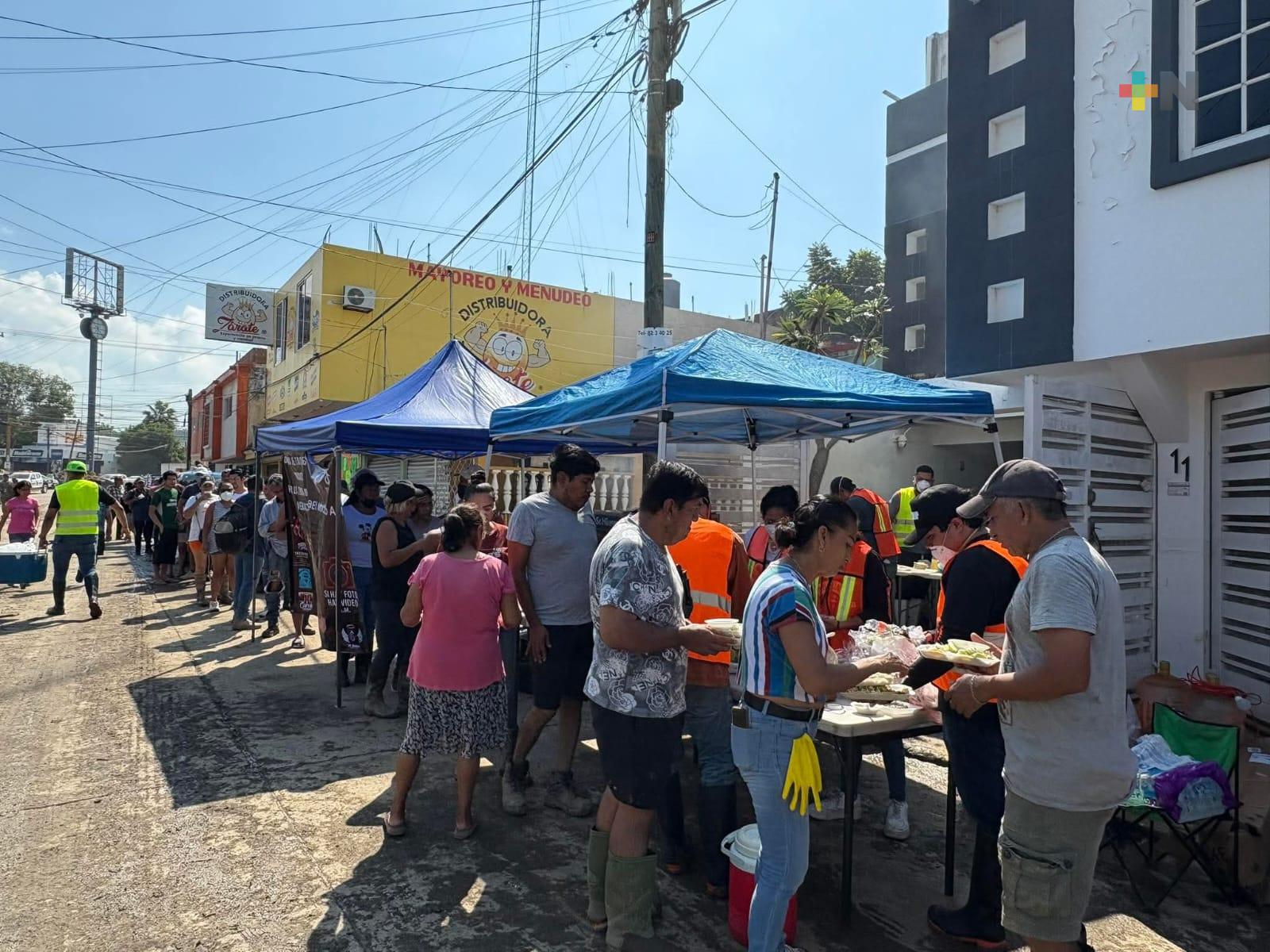 Viajaron desde Cardel para repartir más de mil órdenes de tacos en Poza Rica