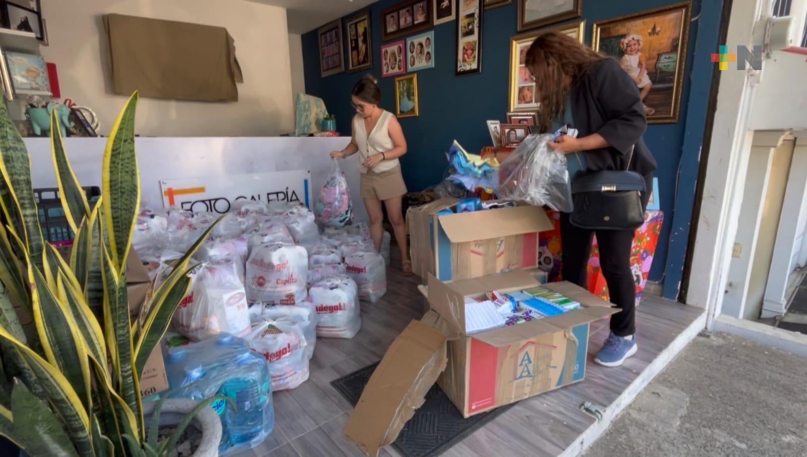 Tras pérdidas por inundaciones, fotógrafos y periodistas reciben apoyo