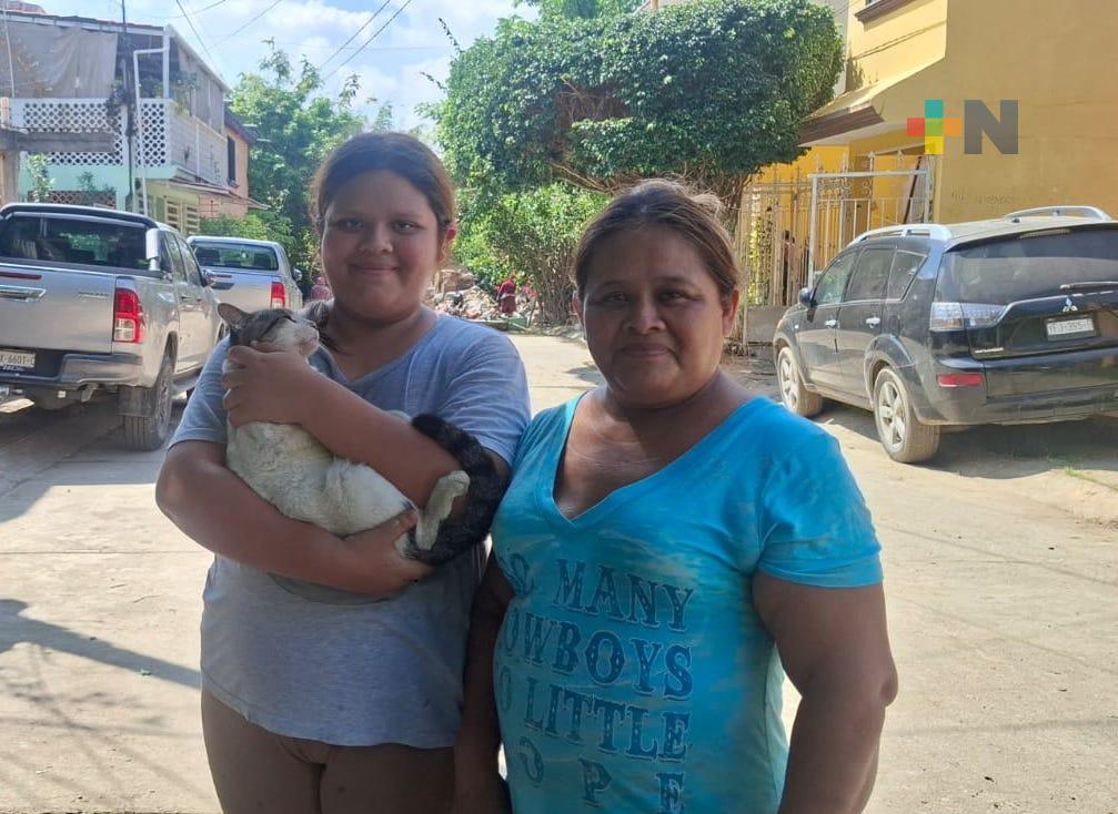 Poza Rica se recupera: familias y mascotas vuelven a sus hogares