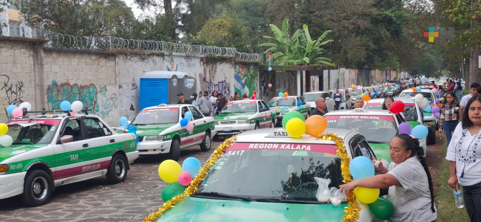Tradicional peregrinación de taxistas llega al barrio del Dique